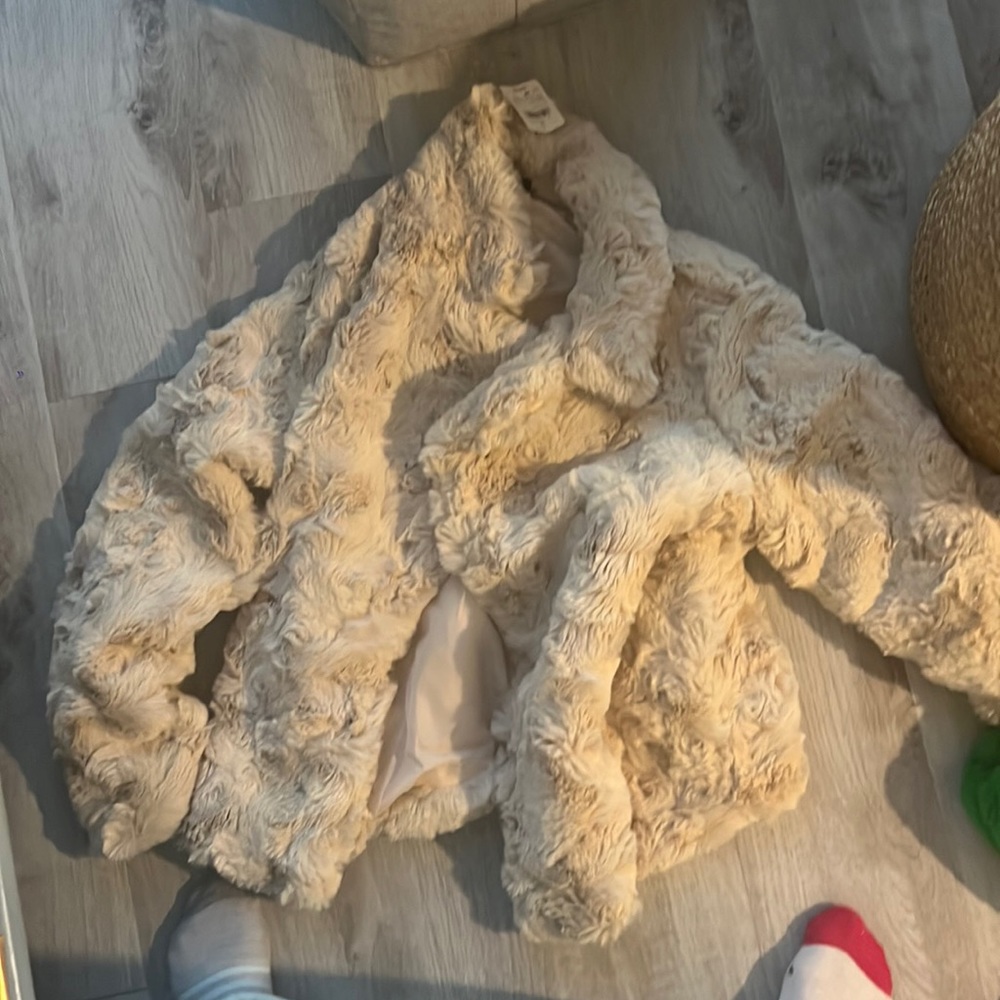 cream fur coat